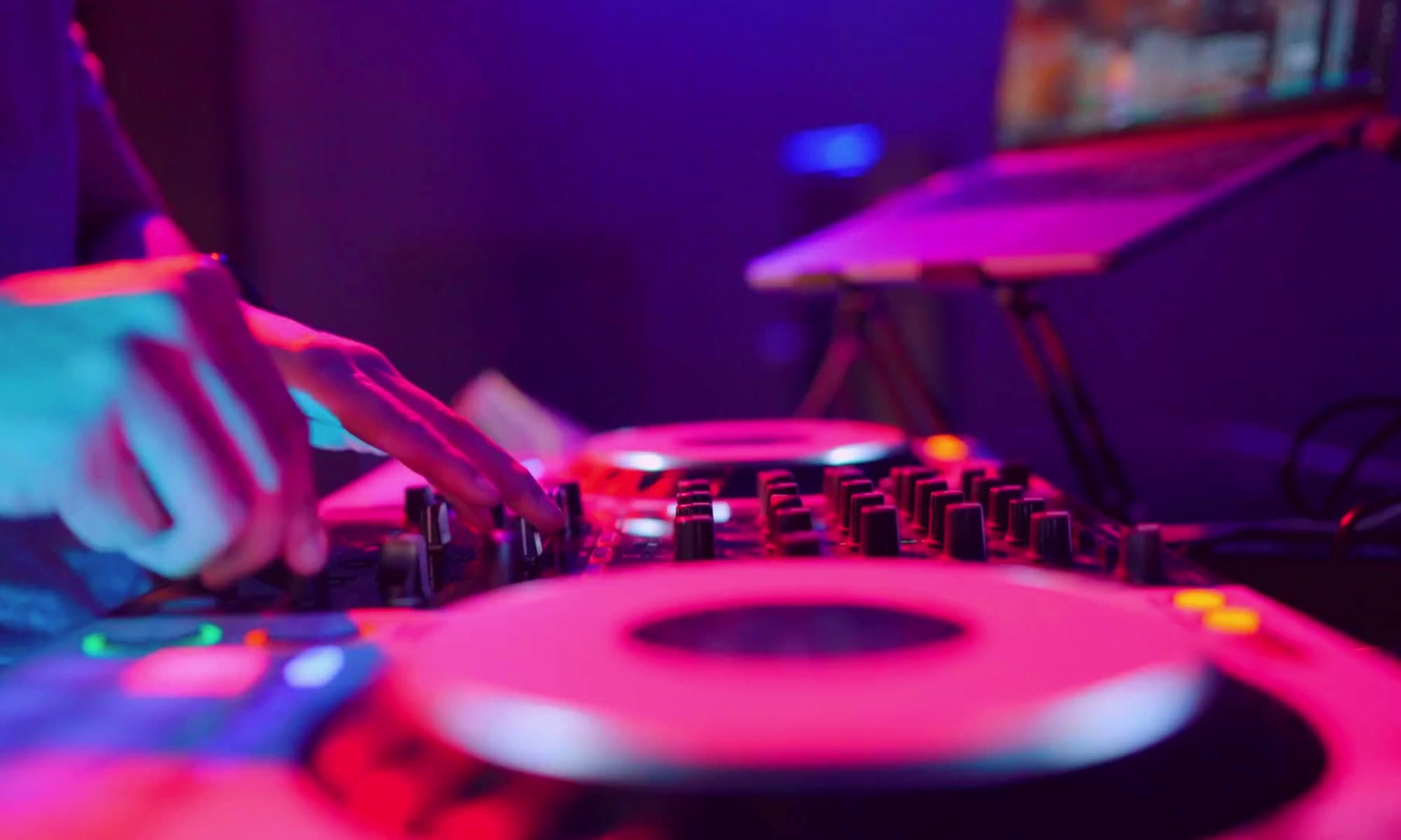 Professional DJ performing at a wedding event in London